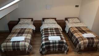 Хостелы City Hostel Коломыя Кровать в общем номере с 4 кроватями-1